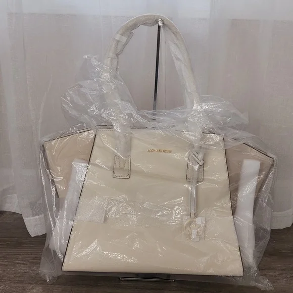 Michael Kors | Bags | Nwt Michael Kors Avril Extralarge  Michael Kors Extra large light cream suede and leather purse,. main image 0